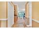Bright hallway with access to kitchen and living areas at 2511 Dolly Bay Dr # 301, Palm Harbor, FL 34684