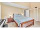 Well-lit bedroom with a double bed and built in closet at 2511 Dolly Bay Dr # 301, Palm Harbor, FL 34684