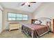 Bright bedroom featuring a king-size bed and large windows at 2511 Dolly Bay Dr # 301, Palm Harbor, FL 34684