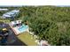 Aerial view showing community pool, clubhouse & private boat docks at 2511 Dolly Bay Dr # 301, Palm Harbor, FL 34684