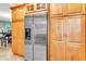 Spacious kitchen with stainless steel appliances and ample wood cabinetry at 2511 Dolly Bay Dr # 301, Palm Harbor, FL 34684
