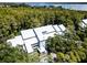 Aerial view of waterfront community building with lake access at 2511 Dolly Bay Dr # 301, Palm Harbor, FL 34684