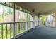 Spacious screened porch with wooded views at 2511 Dolly Bay Dr # 301, Palm Harbor, FL 34684