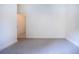 Simple bedroom with carpet flooring and double door closet at 3111 Arrowsmith Rd, Wimauma, FL 33598