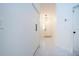 Bright and airy entryway with clean lines and tile floors at 3111 Arrowsmith Rd, Wimauma, FL 33598