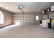 Attached garage with laundry area and automatic door at 3111 Arrowsmith Rd, Wimauma, FL 33598