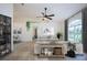 Modern living room, staged with stylish furniture and natural light at 3111 Arrowsmith Rd, Wimauma, FL 33598