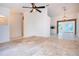 Open floor plan connecting living room and kitchen areas at 3111 Arrowsmith Rd, Wimauma, FL 33598