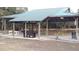 Outdoor pavilion with picnic tables and grill at 3111 Arrowsmith Rd, Wimauma, FL 33598