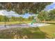 playground with swings and climbing structures at 3111 Arrowsmith Rd, Wimauma, FL 33598