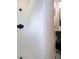 White tiled shower with a modern shower fixture at 3111 Arrowsmith Rd, Wimauma, FL 33598
