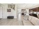Open floor plan connecting the living room to kitchen and entryway at 30425 Pecan Valley Loop, Wesley Chapel, FL 33543