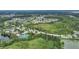Aerial view of community amenities including tennis courts, pool, and park at 30425 Pecan Valley Loop, Wesley Chapel, FL 33543