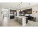 Spacious kitchen with large island and stainless steel appliances at 30425 Pecan Valley Loop, Wesley Chapel, FL 33543
