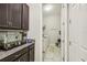 Laundry room with washer, dryer, and additional storage at 30425 Pecan Valley Loop, Wesley Chapel, FL 33543