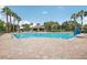 Inviting community pool with a pool house and comfortable seating at 30425 Pecan Valley Loop, Wesley Chapel, FL 33543