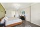 Large Primary bedroom with a king-size bed and en-suite bathroom at 30425 Pecan Valley Loop, Wesley Chapel, FL 33543