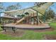 Modern playground with shaded play structure and seating at 30425 Pecan Valley Loop, Wesley Chapel, FL 33543