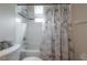 Bathroom with tub shower and updated fixtures at 13049 Thoroughbred Dr, Dade City, FL 33525