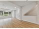 Bright and airy living room featuring hardwood floors and ample natural light at 6605 N Nebraska Ave # 2, Tampa, FL 33604