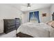 Spacious bedroom with plenty of closet space and natural light at 7864 Broad Pointe Dr, Zephyrhills, FL 33540