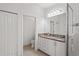 Bathroom with granite vanity and walk-in shower at 4906 Avila Lakes Dr, Wimauma, FL 33598