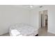 Bedroom with access to bathroom and ceiling fan at 4906 Avila Lakes Dr, Wimauma, FL 33598