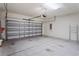 Clean and spacious two-car garage with opener at 4906 Avila Lakes Dr, Wimauma, FL 33598