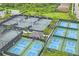 Aerial view of tennis and pickleball courts at 4906 Avila Lakes Dr, Wimauma, FL 33598