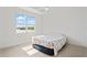 Bright bedroom with water view and ceiling fan at 4906 Avila Lakes Dr, Wimauma, FL 33598