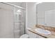 Clean bathroom with granite countertop and walk-in shower at 4906 Avila Lakes Dr, Wimauma, FL 33598