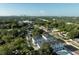 Aerial view of townhouses with city skyline in background at 6605 N Nebraska Ave # 2, Tampa, FL 33604