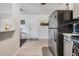 Bright kitchen featuring stainless steel appliances and a view to the entryway at 1611 Stevenson Dr, Clearwater, FL 33755