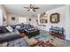 Spacious living room features an accent rug, wood flooring, and a stylish decor at 1611 Stevenson Dr, Clearwater, FL 33755