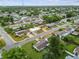 An aerial view of a residential area, showcasing a single Gathering home at 1240 Chelsea Ln, Holiday, FL 34691