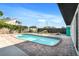 Relaxing rectangular pool with brick coping and deck at 750 Roanoke St, Dunedin, FL 34698