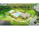 Aerial view of community pool, basketball court, and clubhouse at 1181 Montgomery Bell Rd, Wesley Chapel, FL 33543