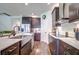 Modern kitchen with stainless steel appliances and farmhouse sink at 1181 Montgomery Bell Rd, Wesley Chapel, FL 33543