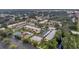 Wide aerial view of community and surrounding area at 2440 Winding Creek Blvd # 201, Clearwater, FL 33761