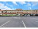 Building exterior with covered parking at 2440 Winding Creek Blvd # 201, Clearwater, FL 33761