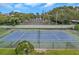 Newly resurfaced tennis court with surrounding fence at 2440 Winding Creek Blvd # 201, Clearwater, FL 33761