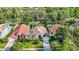 Aerial view of a two-story house with a large backyard and two-car garage at 9083 Quail Creek Dr, Tampa, FL 33647