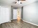 Bedroom with access to bathroom and dual closets at 9083 Quail Creek Dr, Tampa, FL 33647