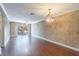 Bright living room with wood floors and view at 4611 W Fig St # 304, Tampa, FL 33609