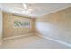 Spacious bedroom with neutral walls and carpet at 4611 W Fig St # 304, Tampa, FL 33609