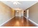 Spacious dining room with hardwood floors and a chandelier at 4611 W Fig St # 304, Tampa, FL 33609