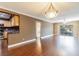 Spacious living room with wood floors and view at 4611 W Fig St # 304, Tampa, FL 33609