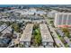 An apartment building complex with lush landscaping and a city view at 4611 W Fig St # 304, Tampa, FL 33609