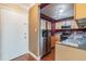 Condo kitchen with stainless steel fridge at 4611 W Fig St # 304, Tampa, FL 33609