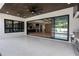 Covered patio with sliding glass doors leading to interior at 3305 W Beaumont St, Tampa, FL 33611